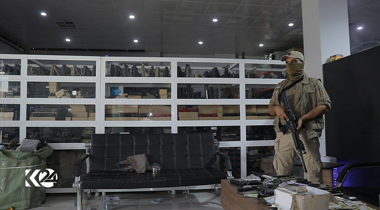 A member of the internal security force stands guard at a seized illegal gun manufacturing site in Erbil, July 3, 2023. (Photo: Submitted to Kurdistan 24)